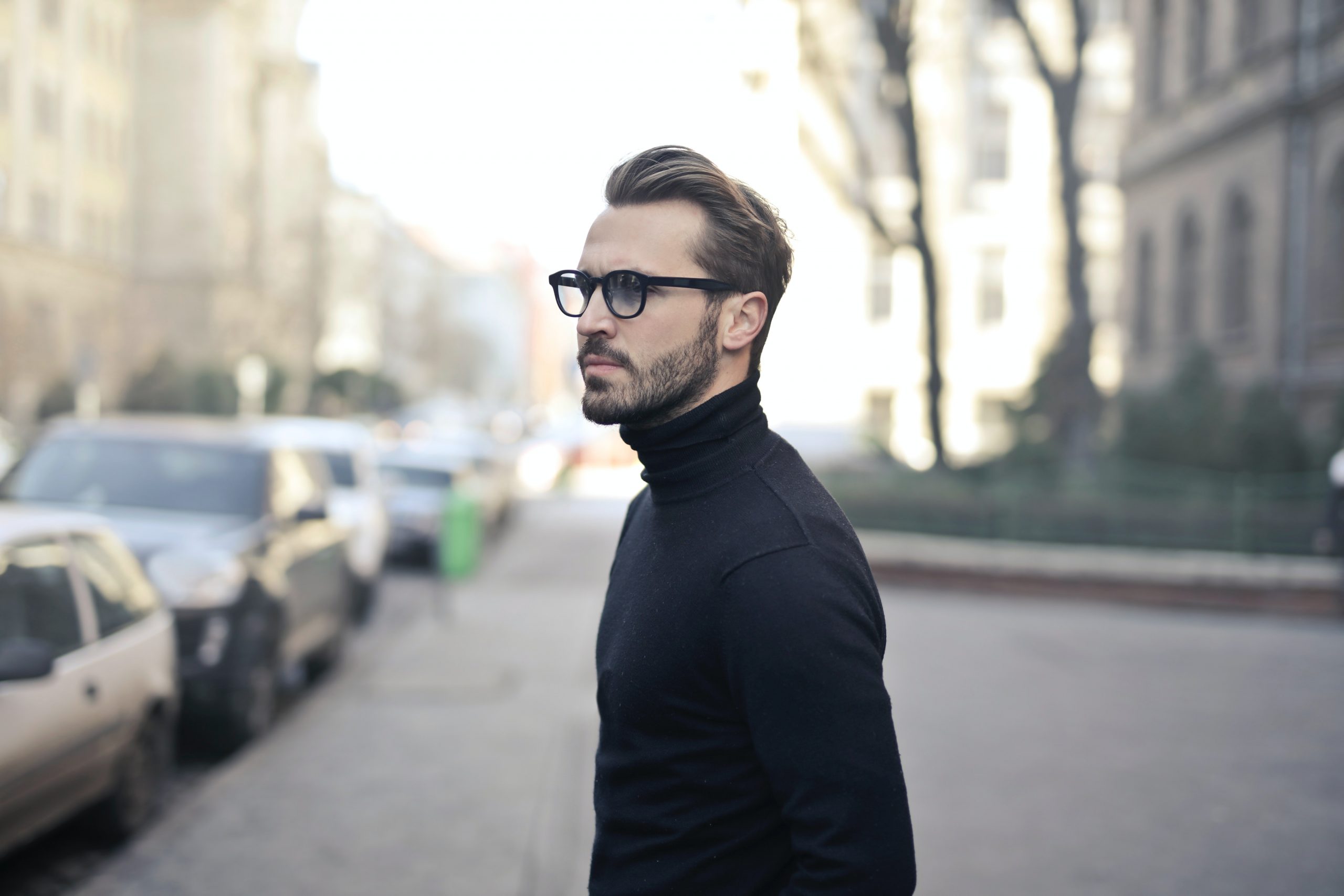 man-standing-on-street-839011